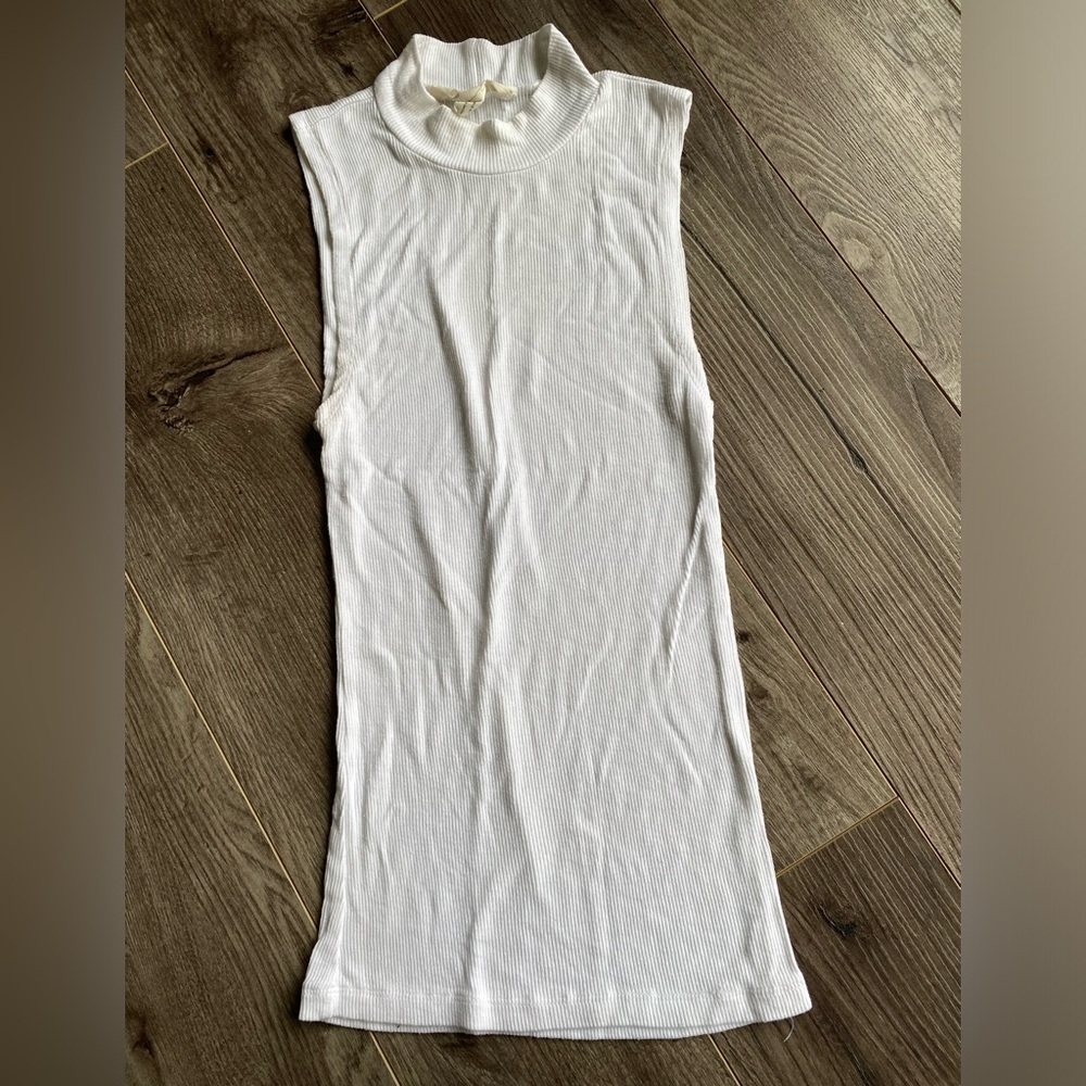 3/$15 basic ribbed mockneck tank top. Fitted. Soft & stretchy.